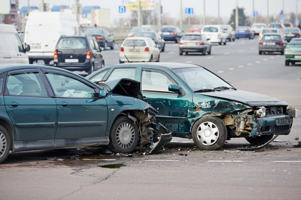 Car crash happening along the highway.