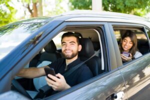 Rideshare driver picking up the booked passenger.