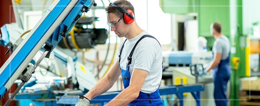 a worker on the job in a factory