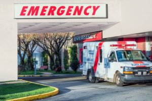 Ambulance in front of Emergency entrance of a hospital