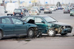 Car crash happening along the highway.