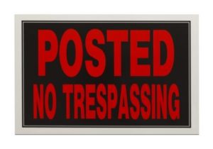 A no trespassing sign in Houston TX.