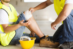 injured worker at a construction site