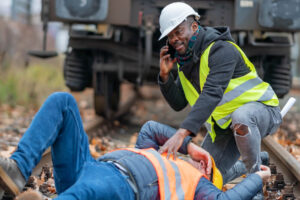 Railroad engineer injured in an accident at work on the railway tracks.
