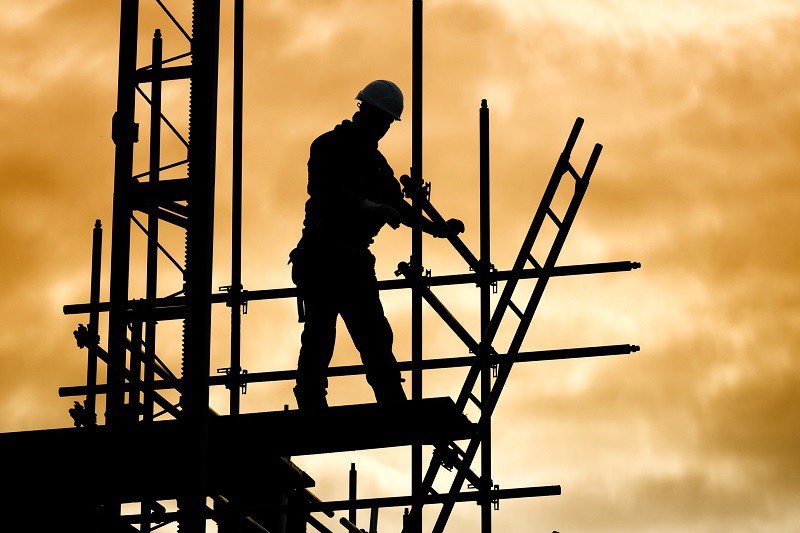 Construction worked on scaffolding